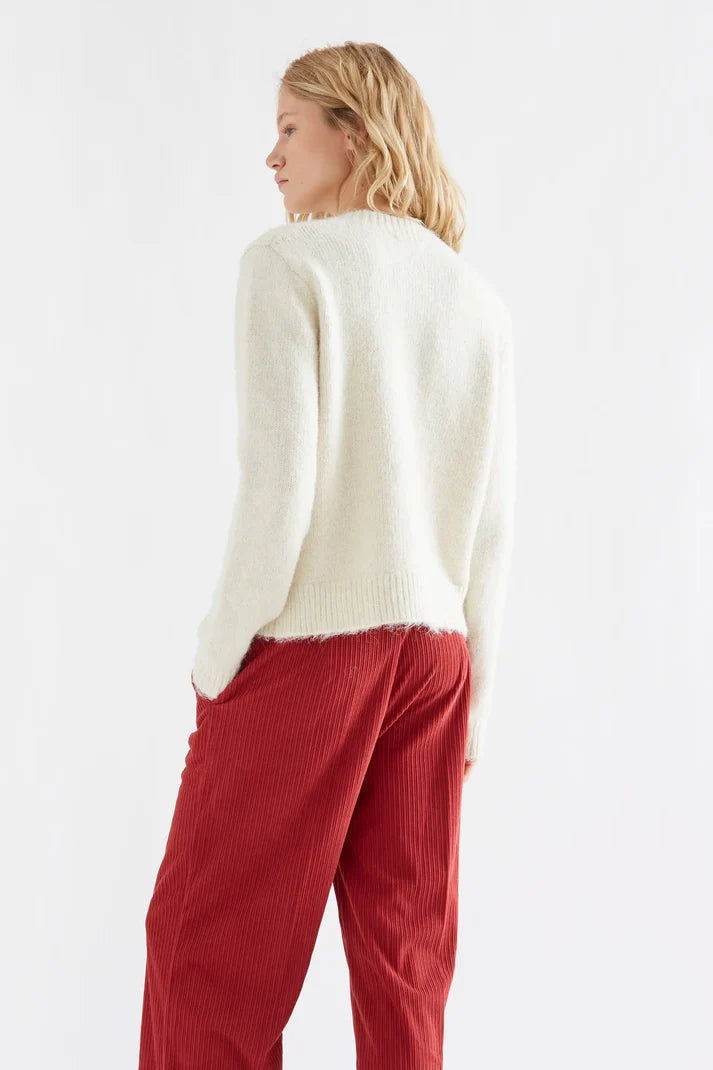 Ecru cardigan met multicolor knopen